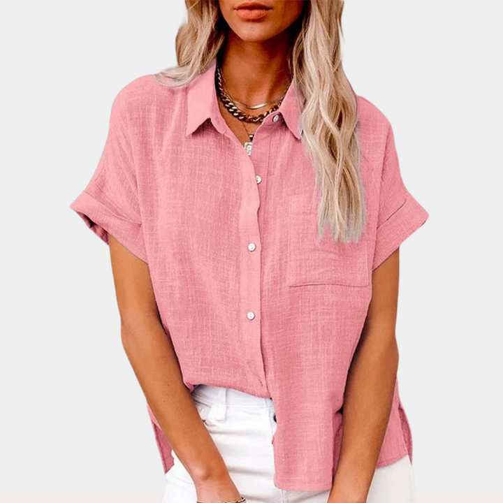 Women's lightweight button-up shirt. Elegant long sleeve top with front pocket for comfort & style.