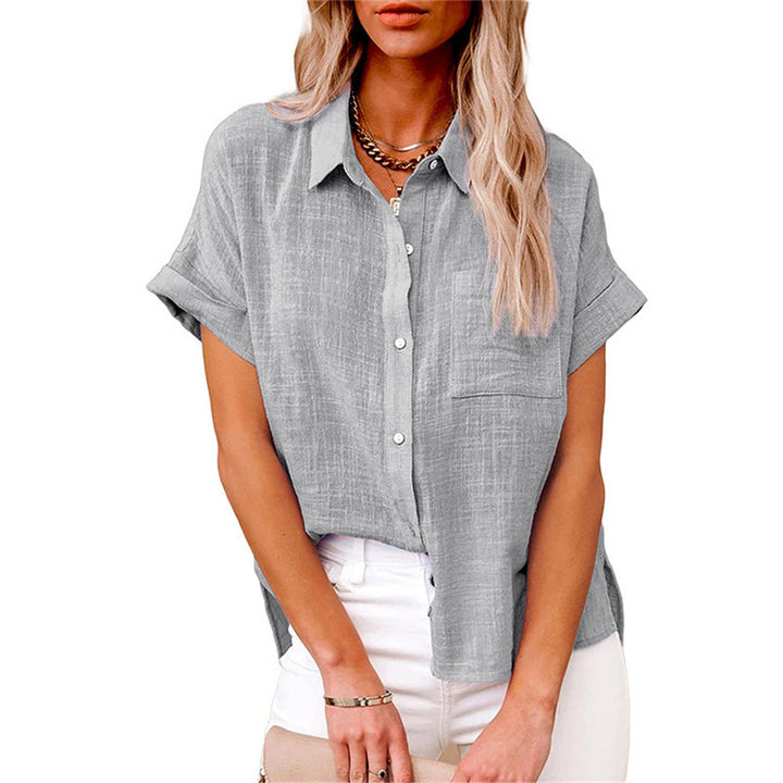 Stylish women's button-up shirt featuring a front pocket. Lightweight long sleeve top for casual chic wear.