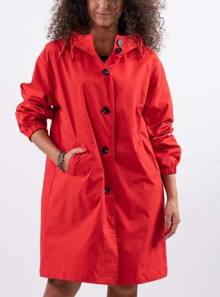 This women's rain jacket features a durable, water-repellent hood and long fit.