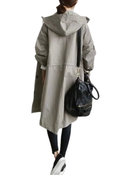 Full view of a women's long rain jacket with hood, perfect for rainy commutes.