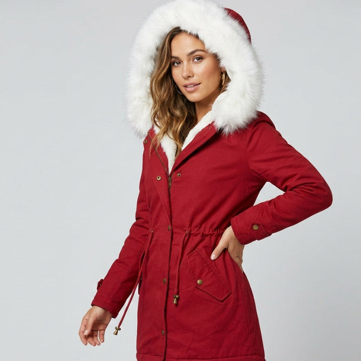 Cozy long hooded coat for women, perfect for winter, with fur trim and belt detail