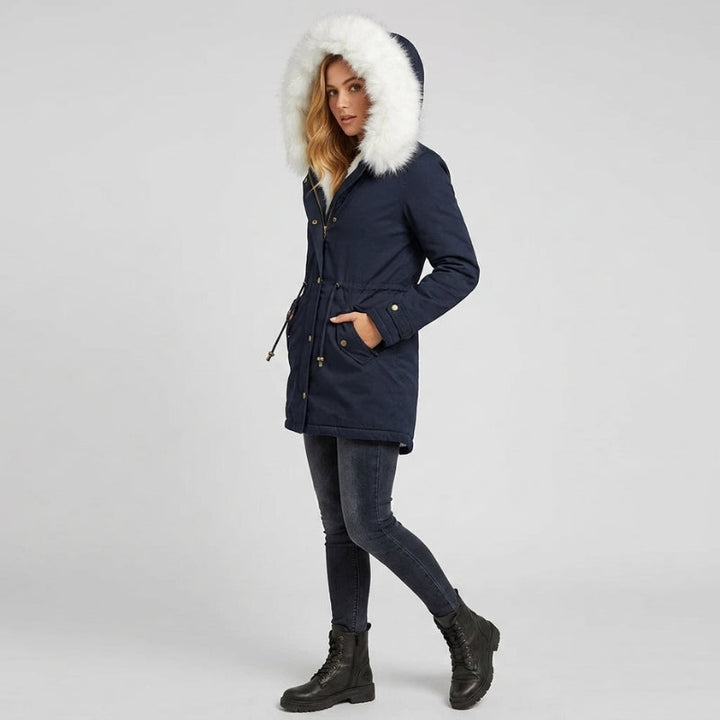 Fashionable long puffer coat for women, complete with a fur-lined hood and belt