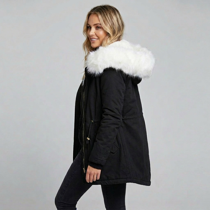 Chic women's winter outerwear: a long hooded coat with a removable fur trim