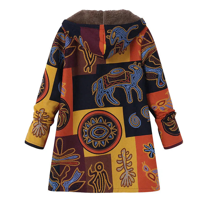 Discover this new women's long hooded jacket, a key outerwear piece