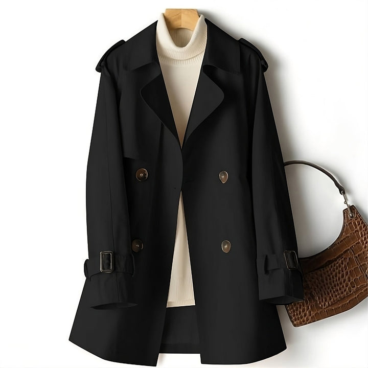 Elegant Long Marissa trench coat in a rich navy, ideal for sophisticated autumn looks.