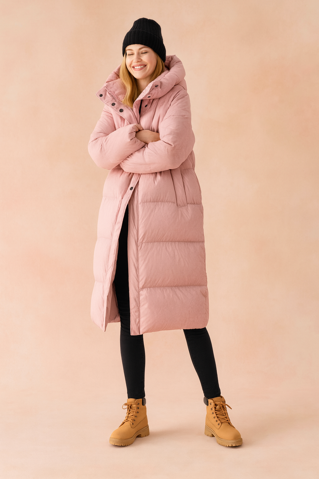 Warm women's long quilted winter coat with a protective hood, ideal outerwear for extreme cold.