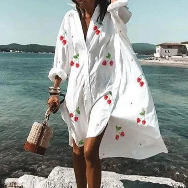 Flowy long sleeve beach cover-up top for women, providing essential sun protection & chic style for summer fashion.