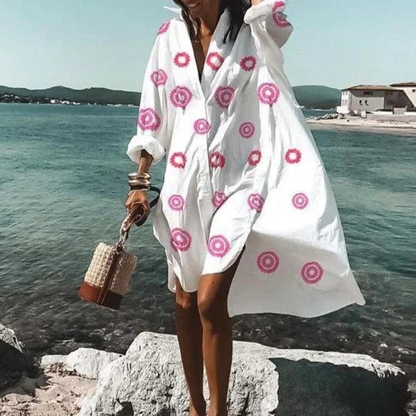 Vacation essential: Women's elegant long sleeve beach cover-up top, offering stylish sun protection and comfort.