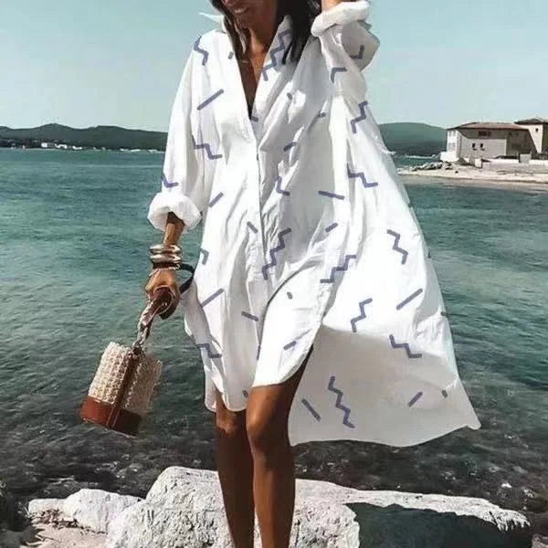 Women's long sleeve beach cover-up top, a versatile summer fashion piece for sun protection & sophisticated beachwear.