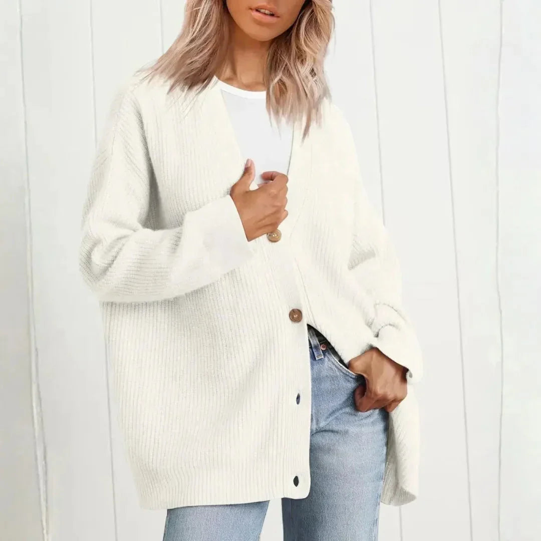 Cozy women's oversized longline cardigan. Soft knit with button front for warm, casual layering in fall & winter.
