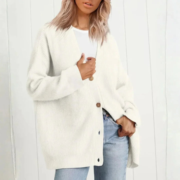 Cozy women's oversized longline cardigan. Soft knit with button front for warm, casual layering in fall & winter.