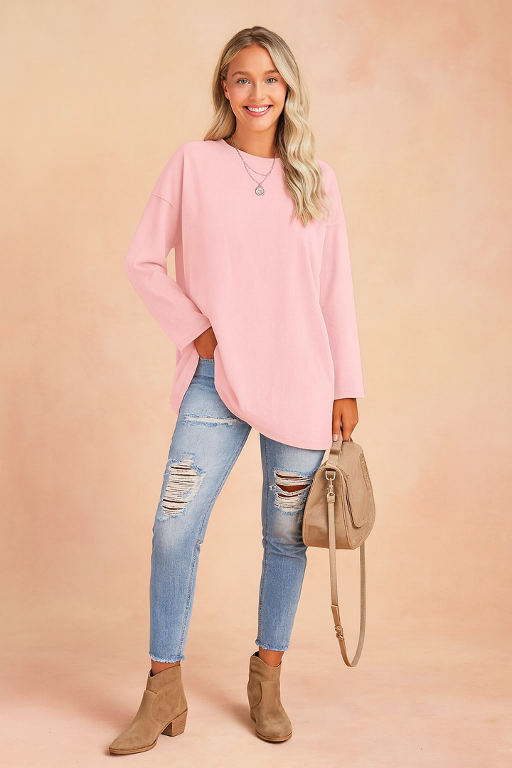 Effortless comfort meets style in this women's loose fit knit sweater.
