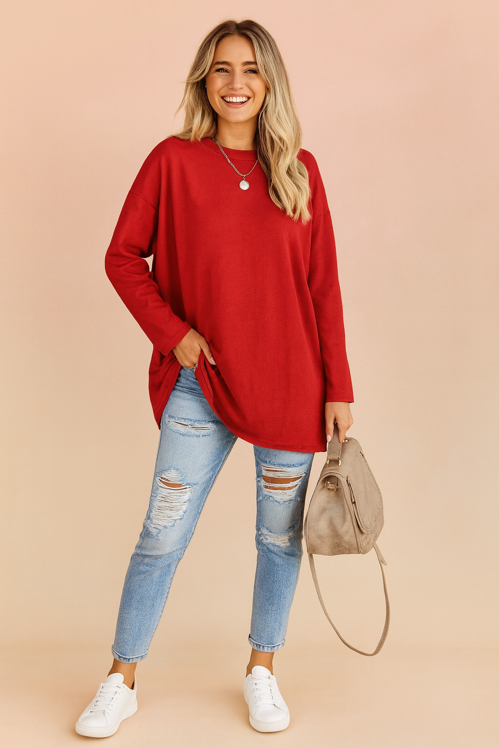 A cozy, oversized women's sweater, perfect as a stylish wardrobe staple for casual outings.