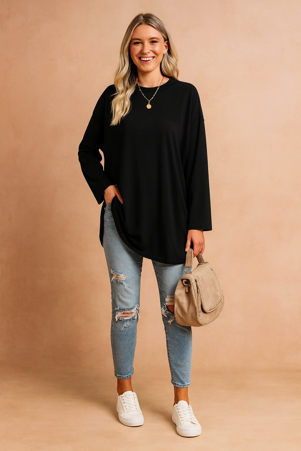 This women's casual wear sweater offers an effortlessly stylish and comfortable oversized silhouette.