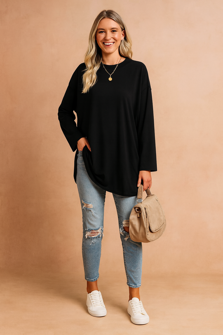 This women's casual wear sweater offers an effortlessly stylish and comfortable oversized silhouette.