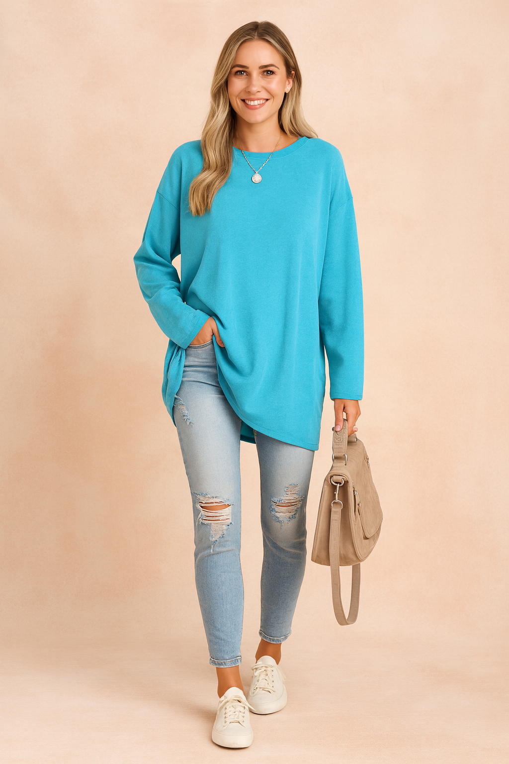 A must-have wardrobe staple: women's loose fit crewneck sweater in a modern design.