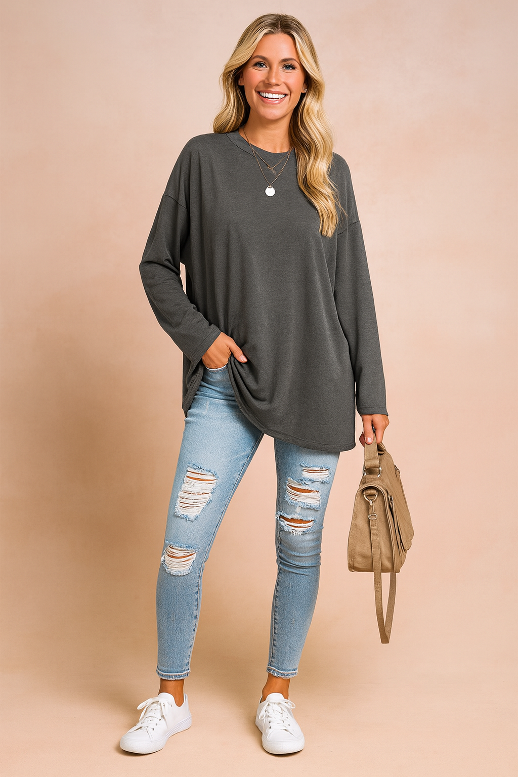 Stay warm and stylish with this comfortable women's long sleeve oversized sweater.