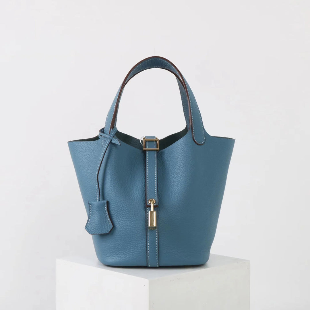 Spacious and stylish taupe leather bucket bag for women