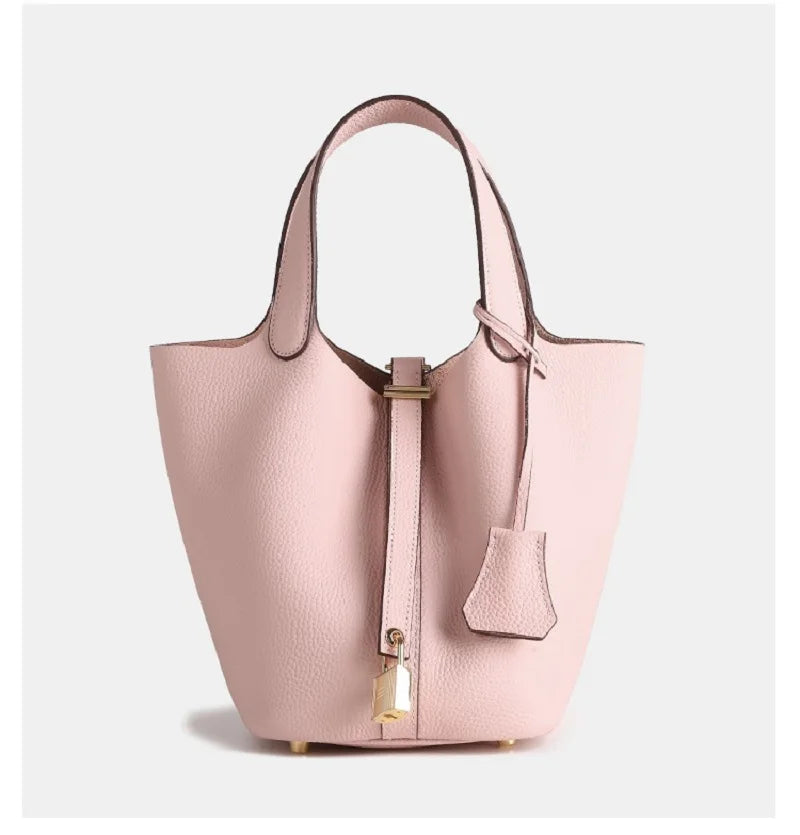 Modern taupe leather handbag, a luxurious women's accessory