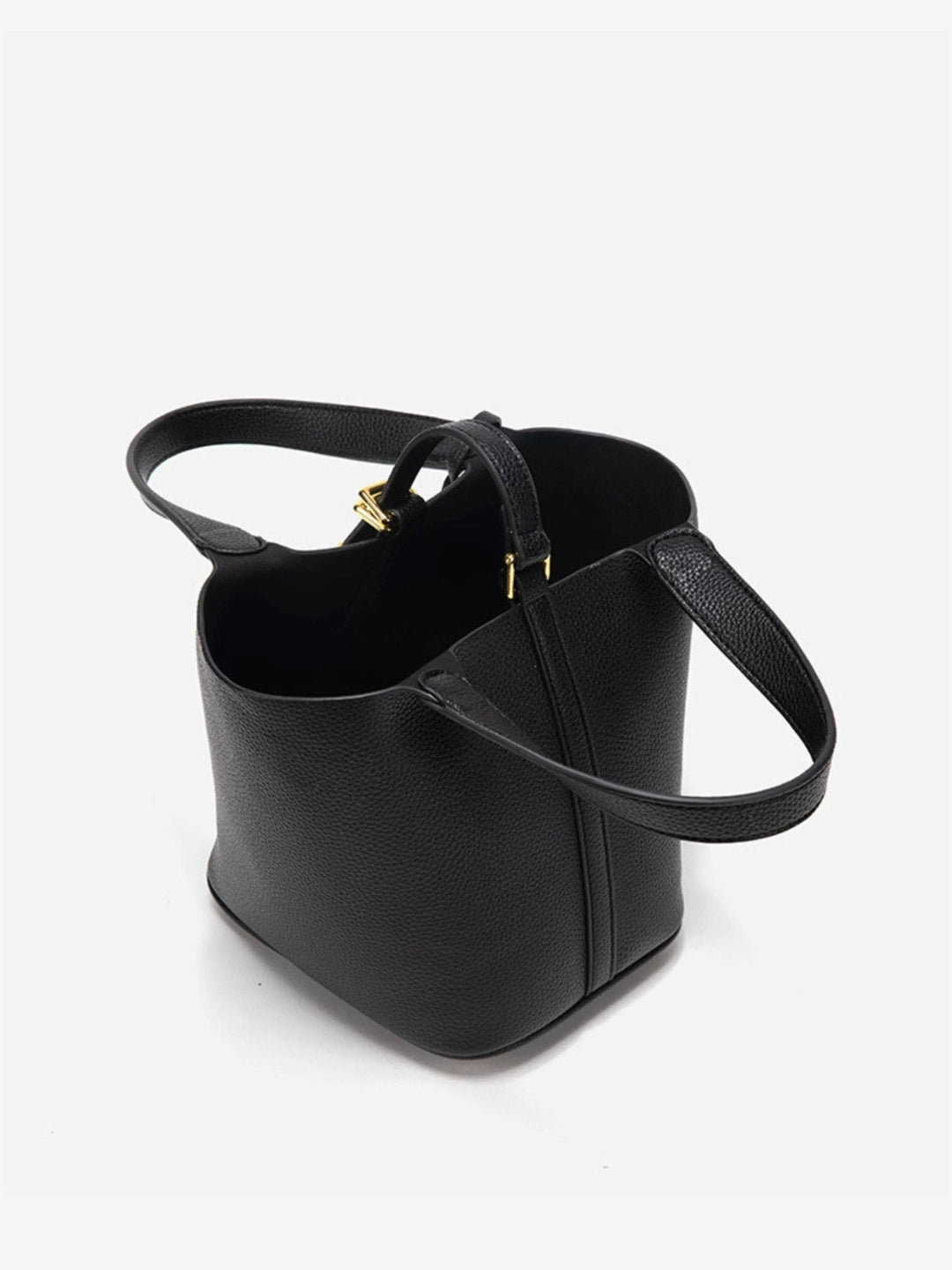 Fashionable women's accessory: taupe leather bucket bag