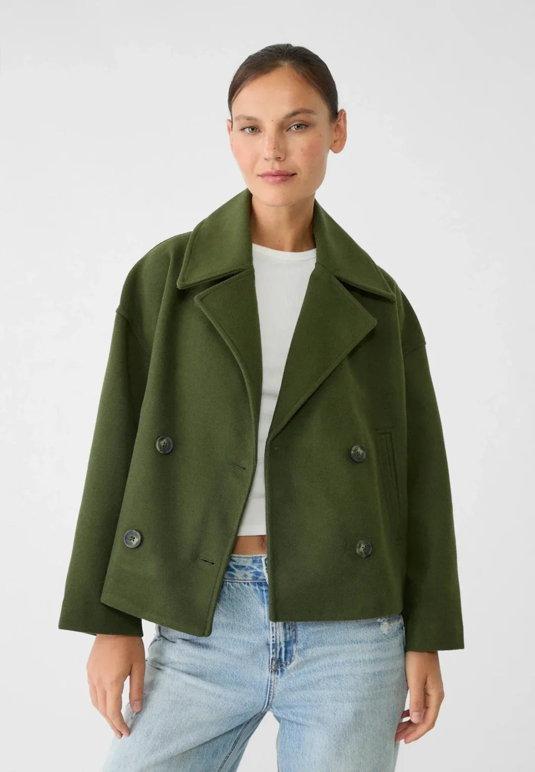 Versatile women's short coat jacket, modern double-breasted outerwear for fall & winter layering.