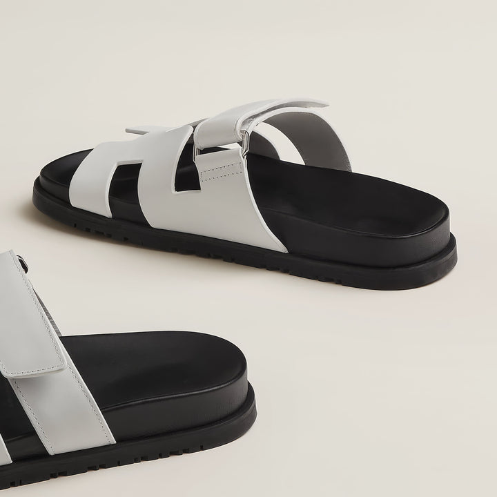Flat sandals for women with a sophisticated modern cut-out pattern