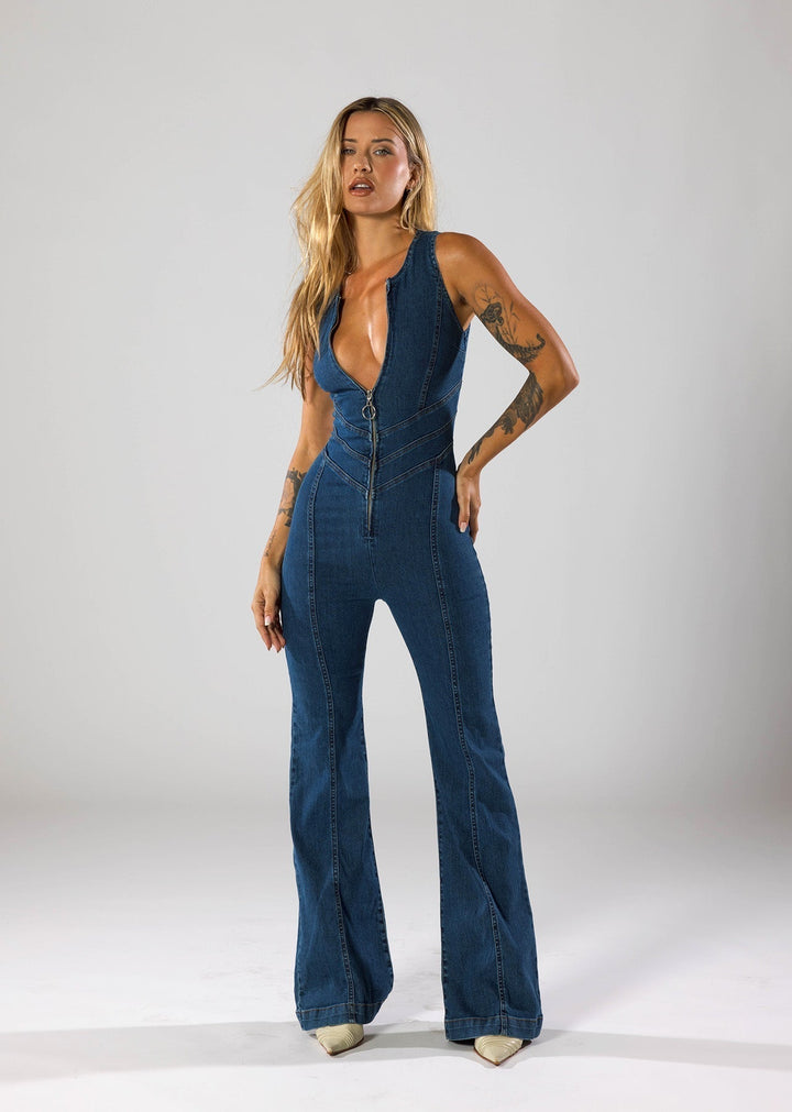 Full-length view of a statement navy blue denim jumpsuit for women