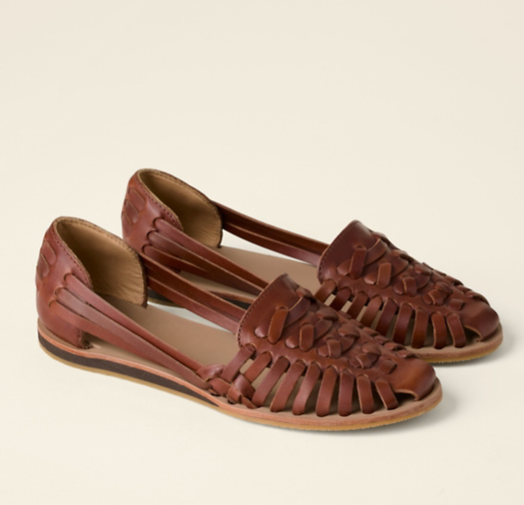 Comfortable women's Olivia brown flat sole sandals featuring a chic closed-toe and slip-on design.