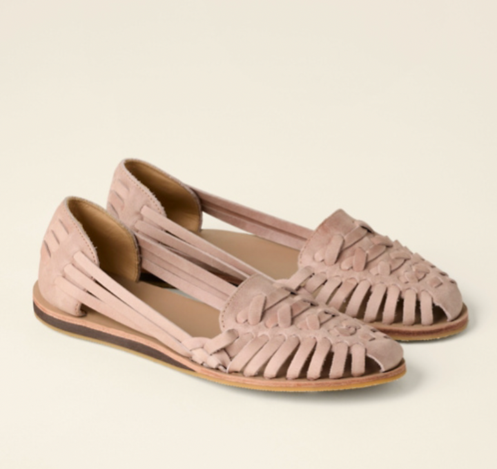 Stylish pink women's Olivia slip-on sandals with elegant woven detailing and a practical closed toe.