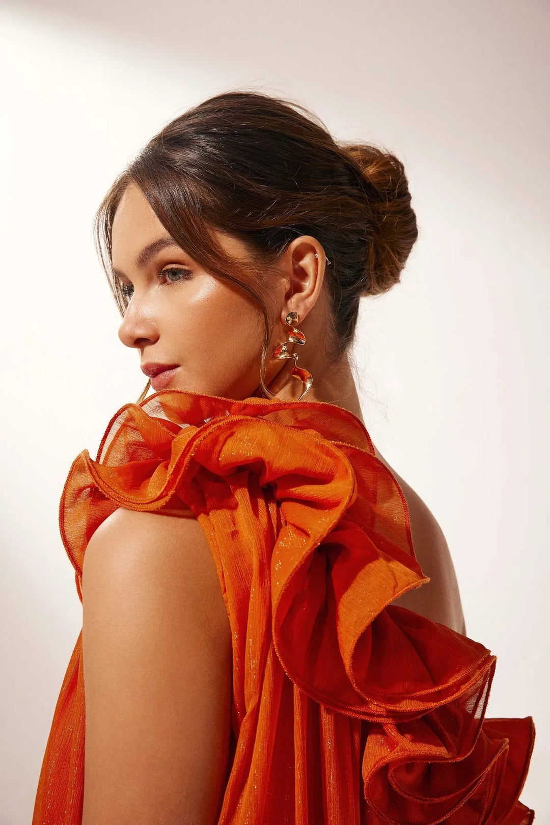 Shop this chic women's maxi dress, perfect for special occasions, featuring an orange floral print.