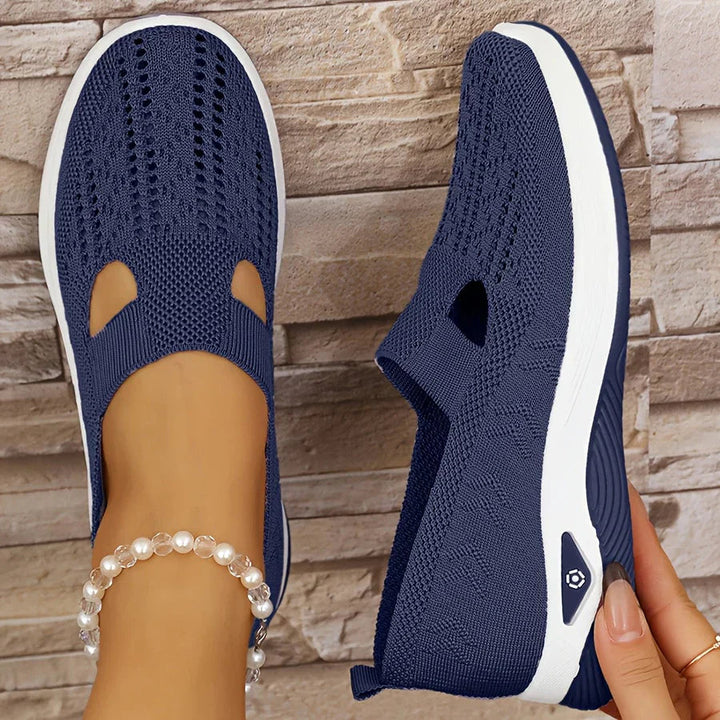 Woman wearing comfortable and supportive orthopaedic slip-on shoes.