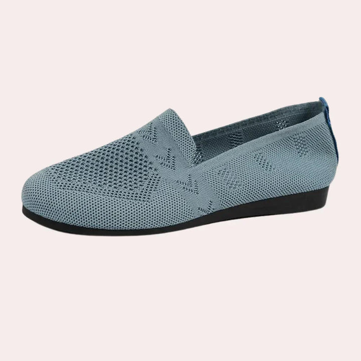Side view of women's supportive orthopedic shoes demonstrating a comfortable fit.