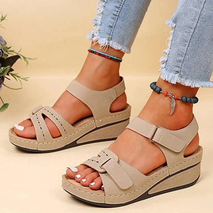 Orthopedic women's footwear, a stylish hiking sandal in navy, providing superior arch support & stability.