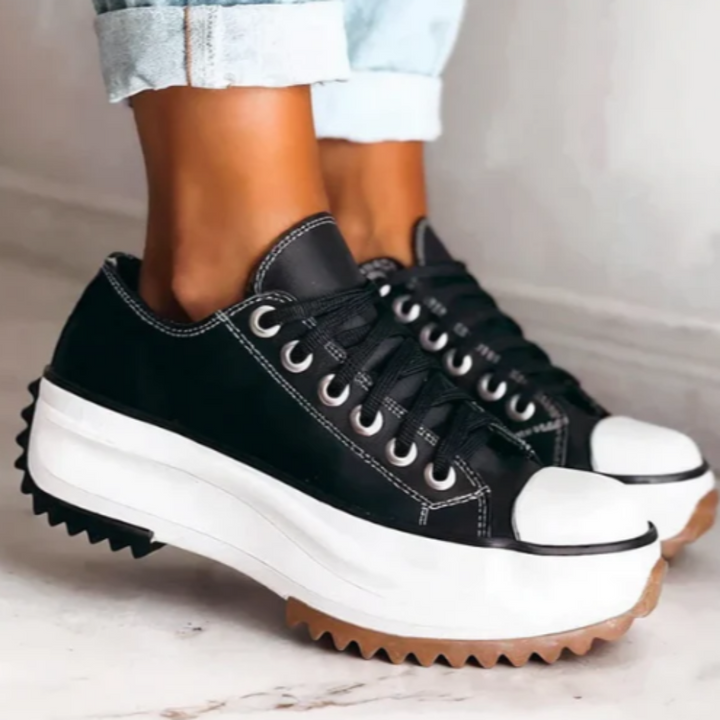 Women's orthopedic platform shoes in white, offering comfort and stylish everyday wear.