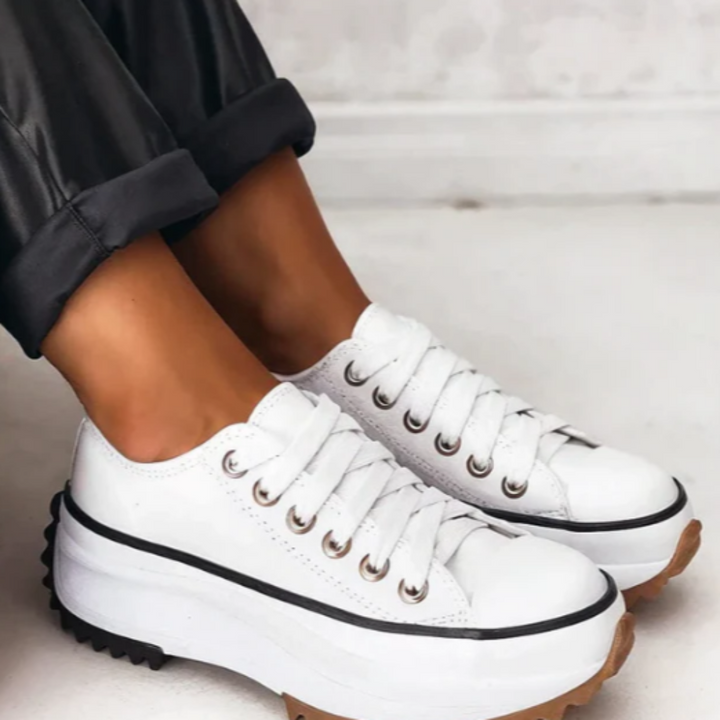 Side view of women's comfortable slip-on platform orthopedic shoes, perfect for fashion footwear.