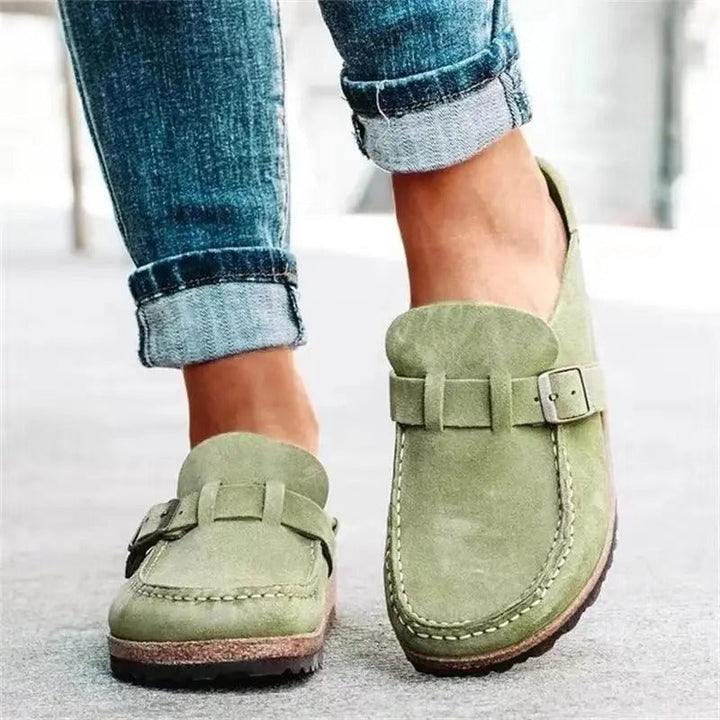 Durable women's orthopedic house slippers, soft cushioning & non-slip sole for ultimate comfort.