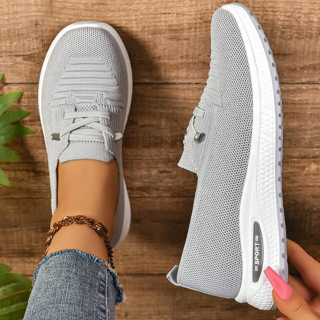 Women's orthopedic sneakers with arch support for all-day comfort and casual wear.