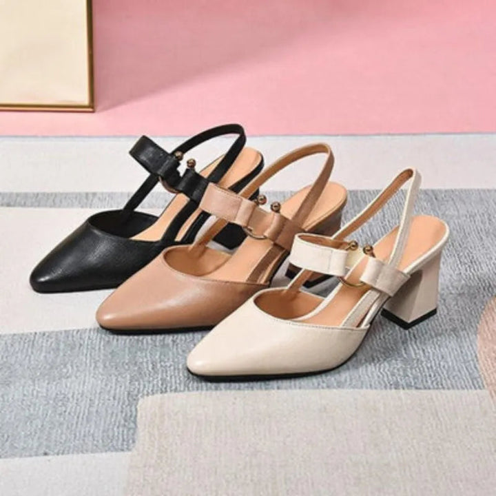 Classic black women's dress shoes with orthopedic support, comfortable for long hours.