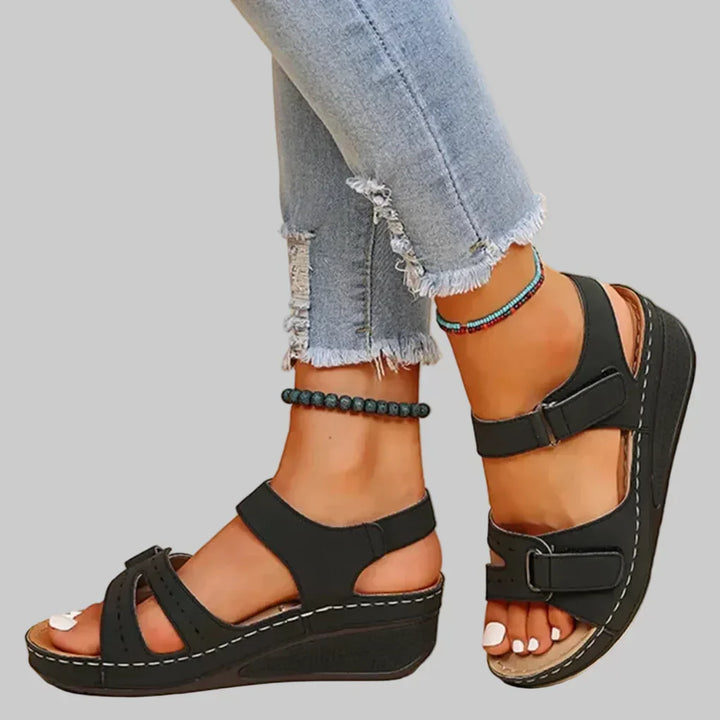 Women's orthopedic wedge sandals with adjustable straps for comfort & support. Ideal for summer walking.