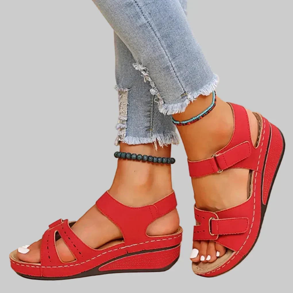Stylish women's wedge sandals with orthopedic support & adjustable straps. Perfect casual spring/summer footwear.