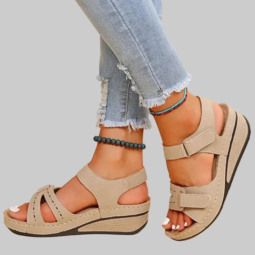 Adjustable women's orthopedic wedge sandals. Provides optimal comfort & arch support for all-day wear.