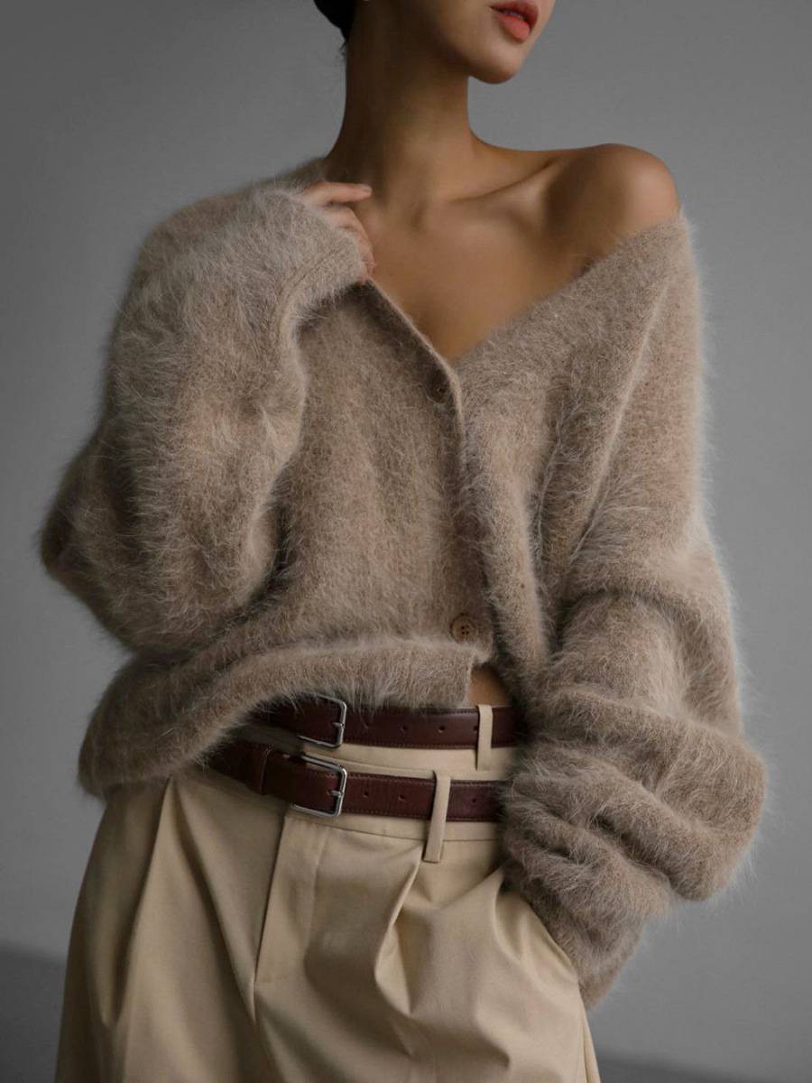 Women's oversized button-up cardigan in a relaxed knit fit, perfect for casual wear.