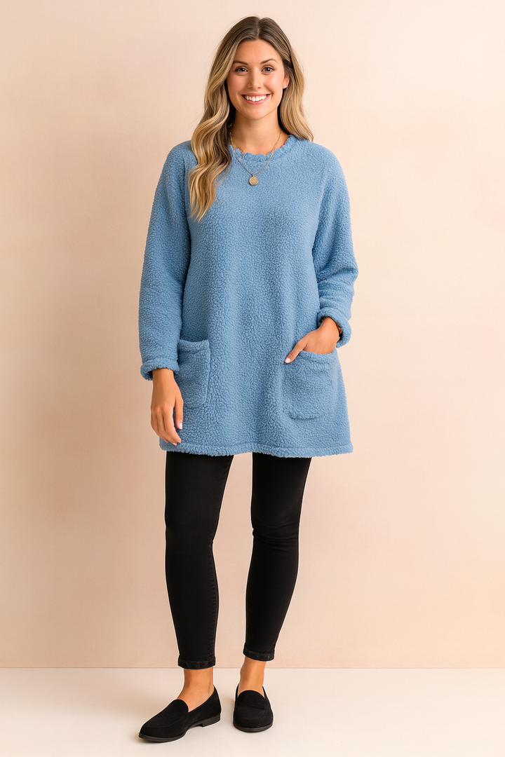 Versatile women's oversized pullover sweater for casual everyday wear. Comfortable loose fit long sleeve knit.