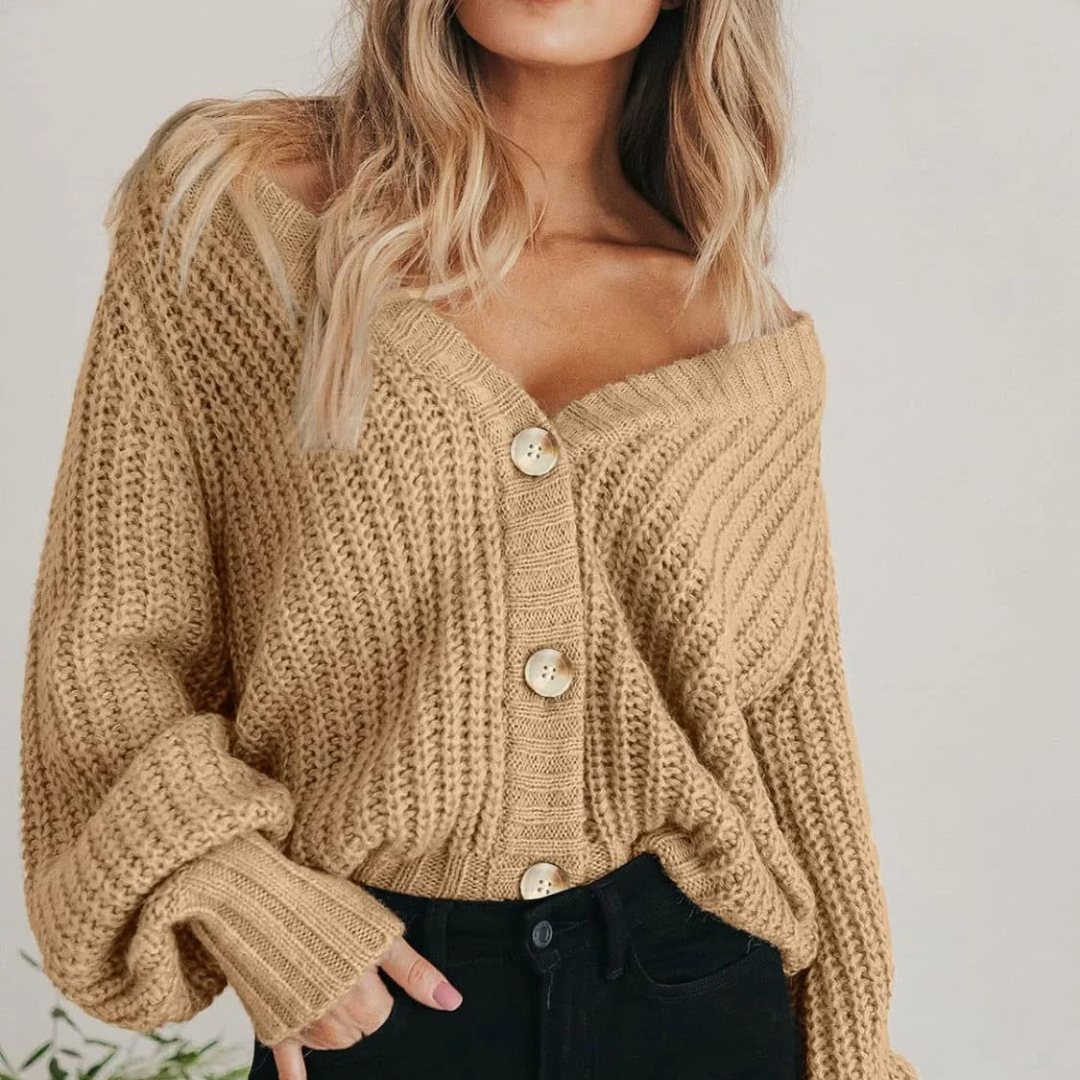 Cozy V-neck chunky knit cardigan for women, featuring trendy balloon sleeves.