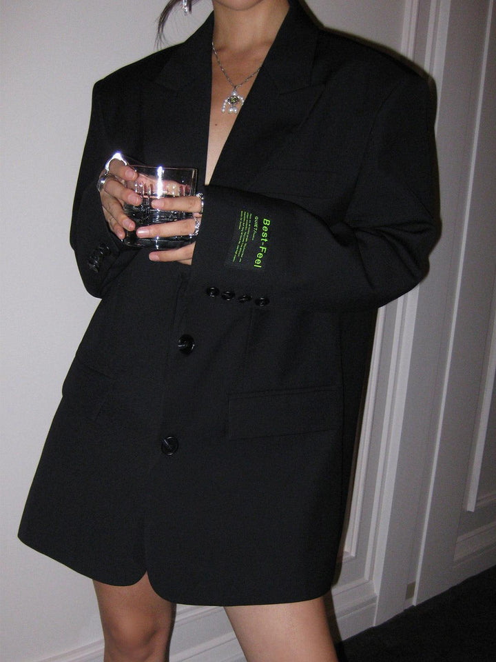 Women's classic oversized blazer coat, an elegant tailored jacket ideal for business, casual, or fashionable layering.