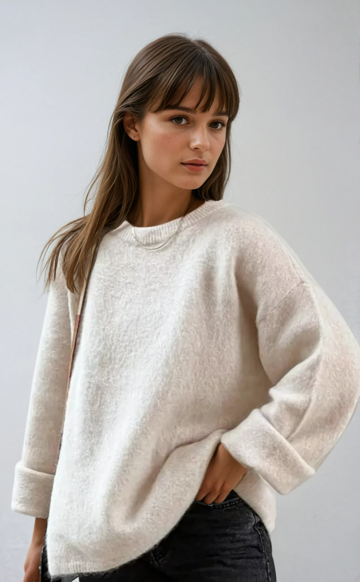 Women's oversized cozy knit sweater in relaxed fit, perfect for winter fashion.