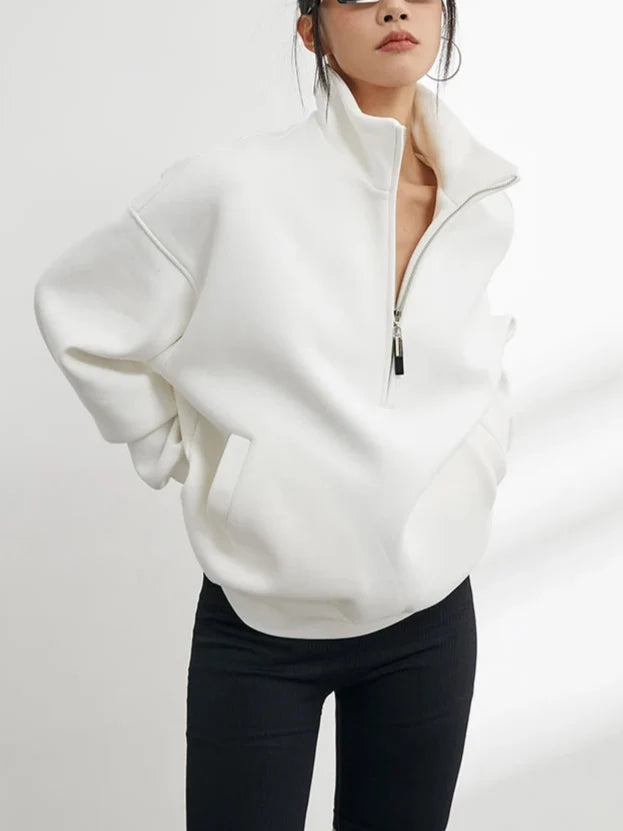Winter fashion women's oversized half-zip hoodie, a comfortable pullover for casual and loungewear styles.