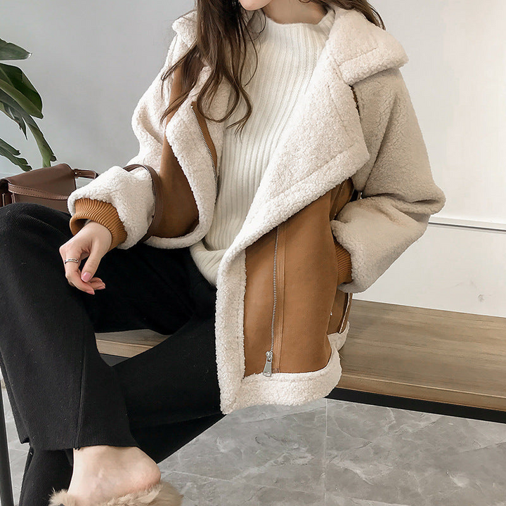 Stylish women's oversized color block jacket with a zip-up design, perfect trendy fall fashion and warm winter outerwear.