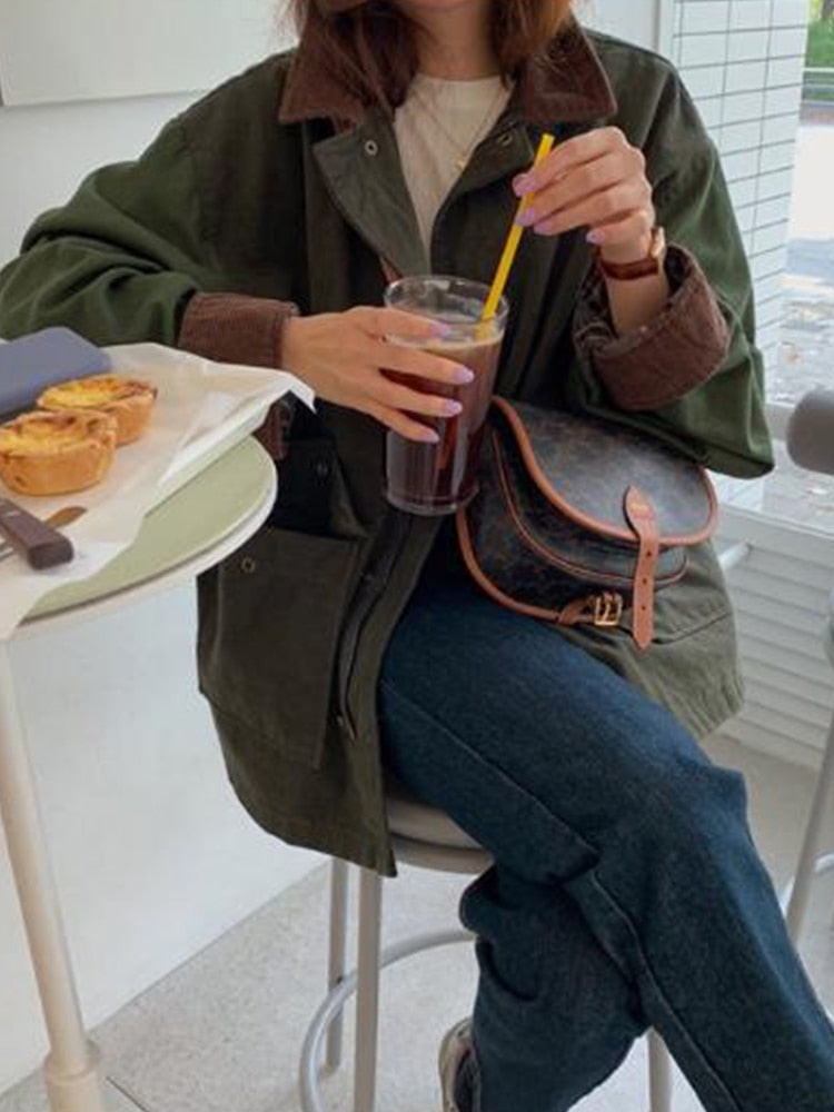 Chic women's oversized jacket, perfect for trendy fall fashion. Comfy ladies outerwear for winter style.