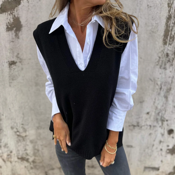 Stylish purple V-neck sweater vest for women, an oversized knitted top designed for trendy layering looks.